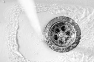 running water down a drain