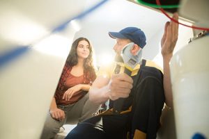 main repairing home plumbing for insurance coverage